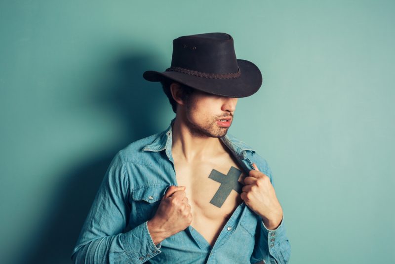 Man with Hat and Tattoo » Tattoo Removal: Methods & Considerations Man with Hat and Tattoo