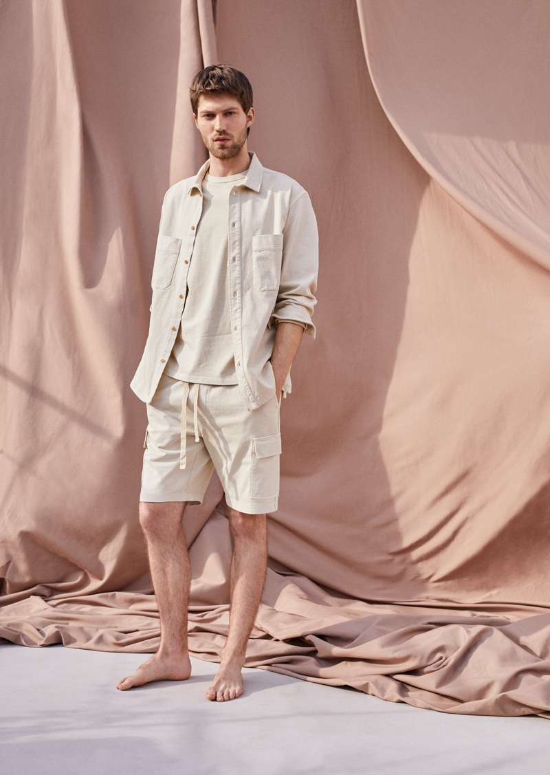 Embracing monochromatic style, Boyd Gates sports a spring look from Mango Committed's Mineral Dyes capsule collection.