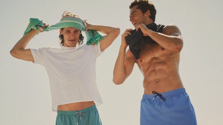 Models Umberto Villahermosa and Alberto Perazzolo hit the beach in Massimo Dutti's latest swimwear collection.