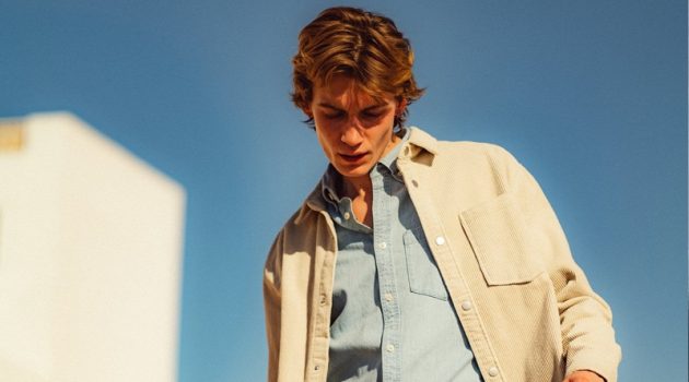 Anton Rocks Spring Denim from Reserved Sporting layered denim, Anton Thiemke wears a Reserved shirt jacket with a denim shirt and jeans.