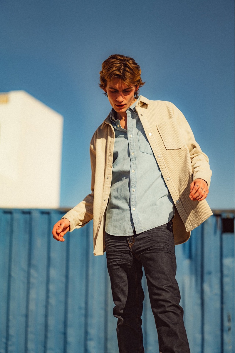 Sporting layered denim, Anton Thiemke wears a Reserved shirt jacket with a denim shirt and jeans.