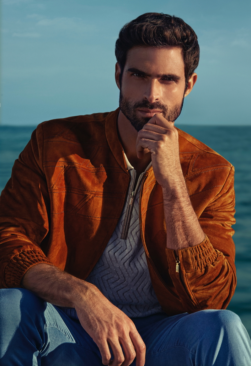 Front and center, Juan Betancourt dons a suede jacket for ZILLI's spring-summer 2021 campaign.