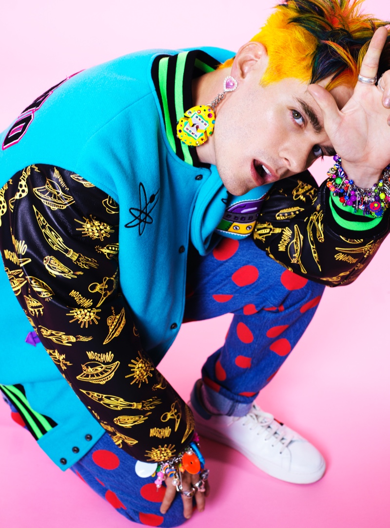 Awsten Knight sports a colorful Moschino look with his own rings and Laser Kitten accessories for VMAN.