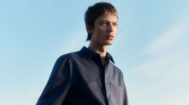 Jonas Glöer dons a patch pocket shirt with slim-fit trousers by COS.