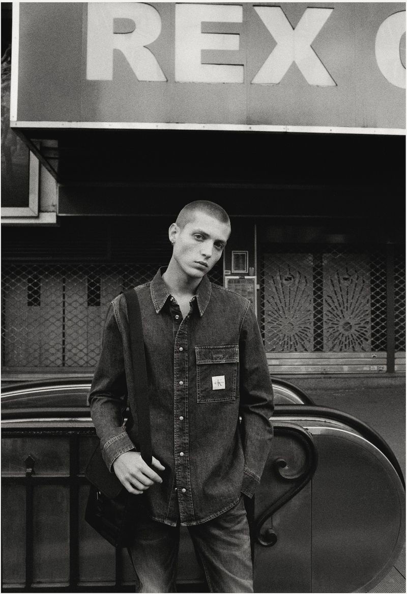 Stepping outdoors in classic denim, Tom Rey fronts Calvin Klein Jeans' spring-summer 2021 campaign.