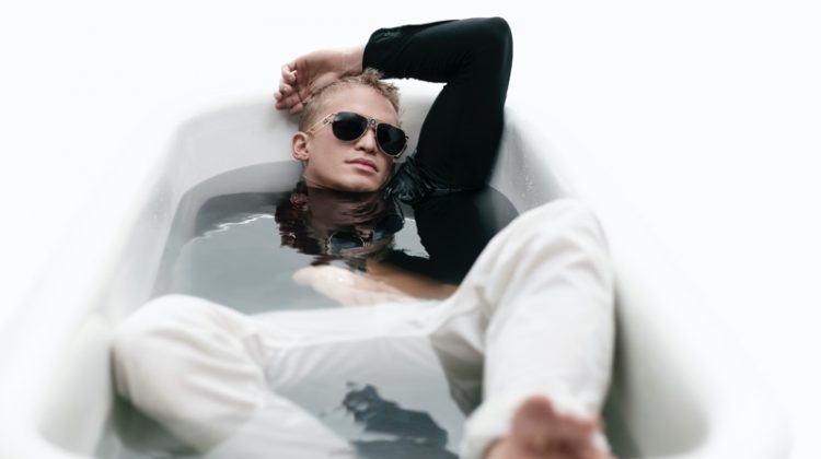 Soaking in a tub, Cody Simpson fronts Versace's spring-summer 2021 eyewear campaign.