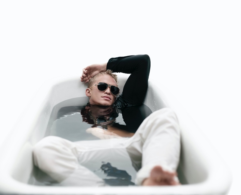 Soaking in a tub, Cody Simpson fronts Versace's spring-summer 2021 eyewear campaign.