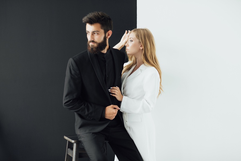 Couple Man Black Suit Woman White Outfit Concept
