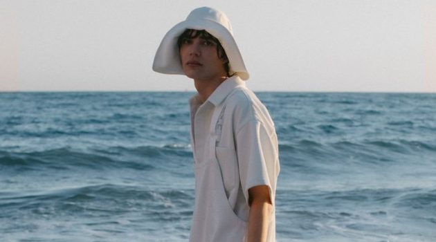 Hernan Cano sports overalls and a safari hat from Emporio Armani's spring-summer 2021 sustainable capsule collection.