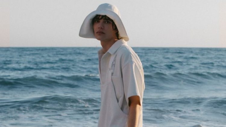 Hernan Cano sports overalls and a safari hat from Emporio Armani's spring-summer 2021 sustainable capsule collection.