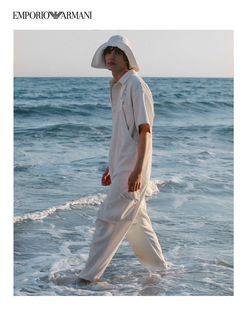 Hernan Cano sports overalls and a safari hat from Emporio Armani's spring-summer 2021 sustainable capsule collection.