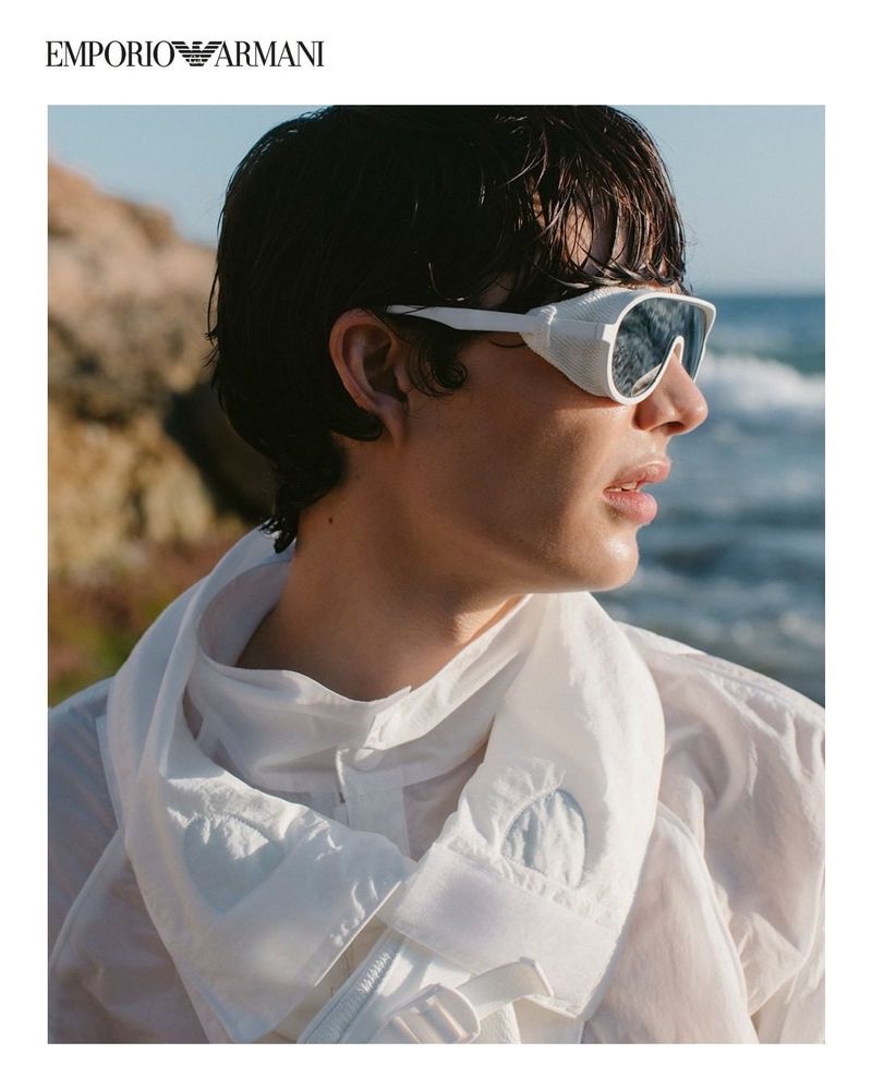 Sporting modern sunglasses, Hernan Cano wears a look from Emporio Armani's spring-summer 2021 sustainable capsule collection.