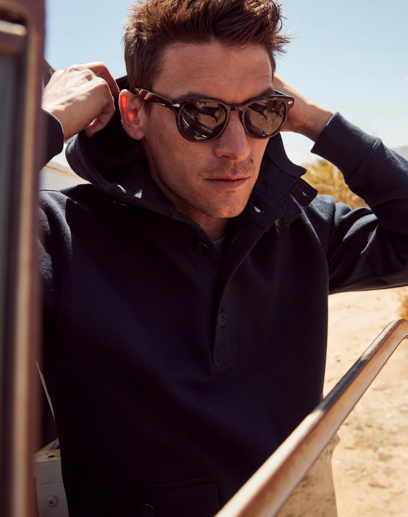 Ready for a breezy day, Miles Garber wears a Wallace & Barnes knit sailing anorak with J.Crew Dock sunglasses.
