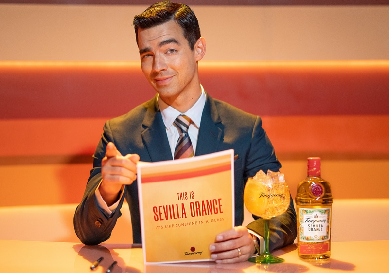 Joe Jonas plays a news anchor for the new Tanqueray Sevilla Orange campaign.