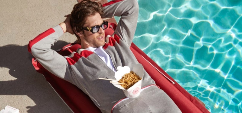 Relaxing poolside, Josh Upshaw wears Stefano Ricci for Neiman Marcus.