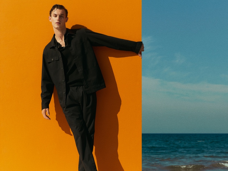 Donning all black, Kit Butler wears a chic look from Massimo Dutti.