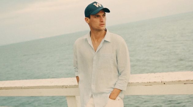 Miles Garber Inspires in Summer Style for Zara Donning sleek summer style, Miles Garber wears a linen shirt and white pants from Zara.