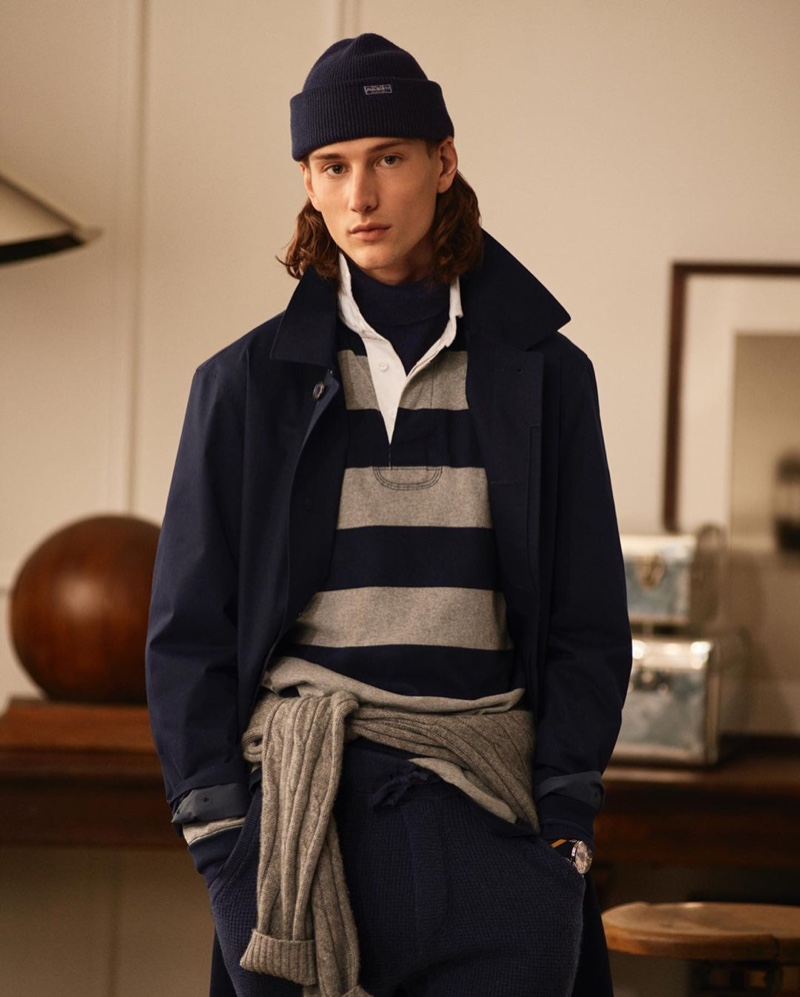 Donning navy and gray, Wellington Grant sports a sleek look by POLO Ralph Lauren.