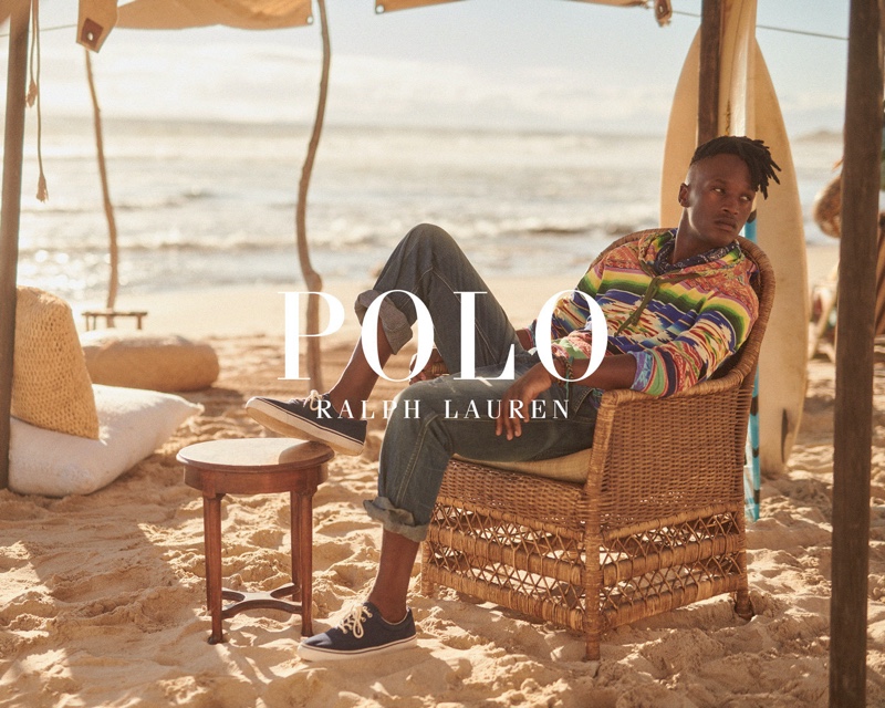 Sporting a colorful hooded pullover, Lwakhe Matiwane appears in POLO Ralph Lauren's Wild Coast collection campaign.