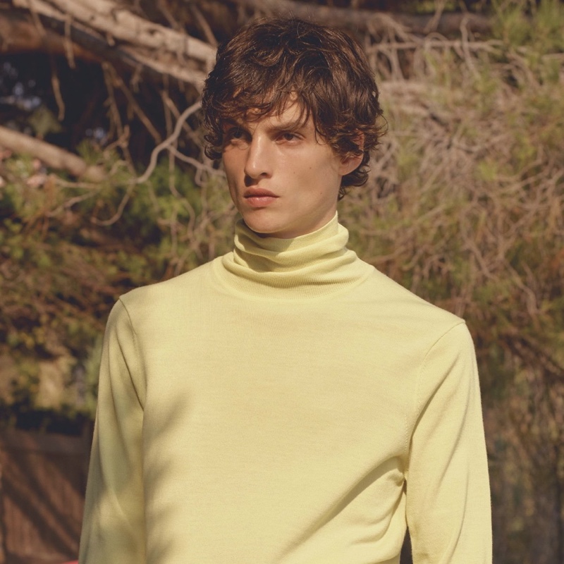 Sporting a yellow turtleneck, Lucas El Bali stars in Sandro's spring-summer 2021 lookbook.