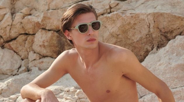 Sporting sunglasses and swimwear, Edoardo Sebastianelli connects with Scotch & Soda for summer.
