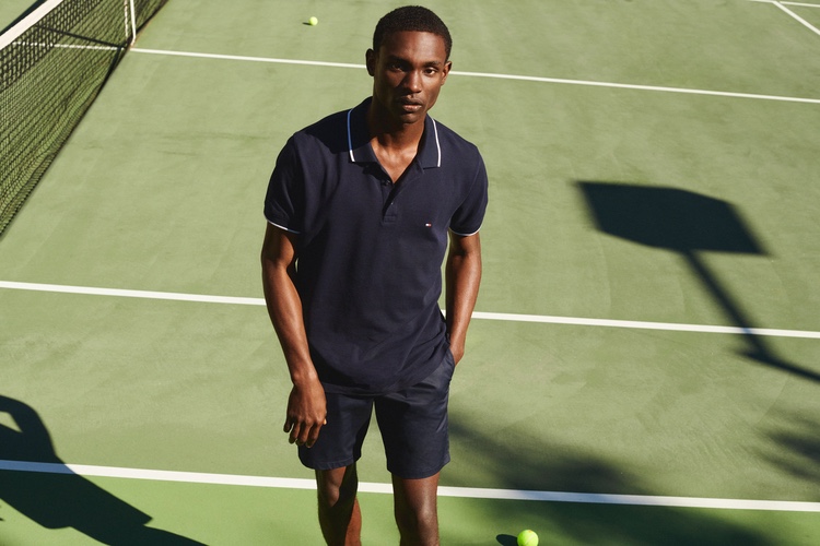 Sporting a navy polo, Victor Ndigwe models a tennis look from Tommy Hilfiger. » Tommy Hilfiger Looks Forward to Father's Day with Fresh Styles Sporting a navy polo, Victor Ndigwe models a tennis look from Tommy Hilfiger.