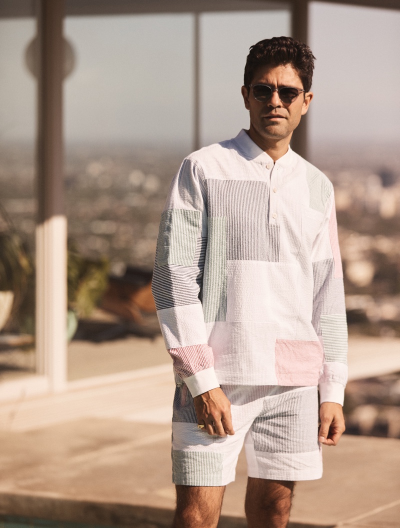 Fueling a certain nostalgia, Adrian Grenier is pictured in a patchwork-like shirt and shorts for Kith's summer 2021 campaign.