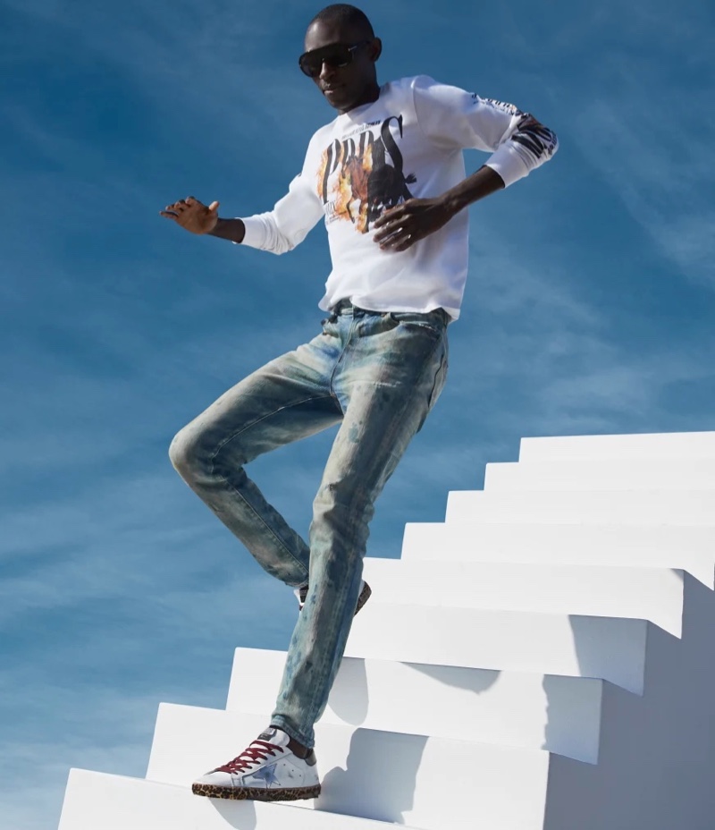 Embracing a casual attitude, Armando Cabral wears PRPS denim.