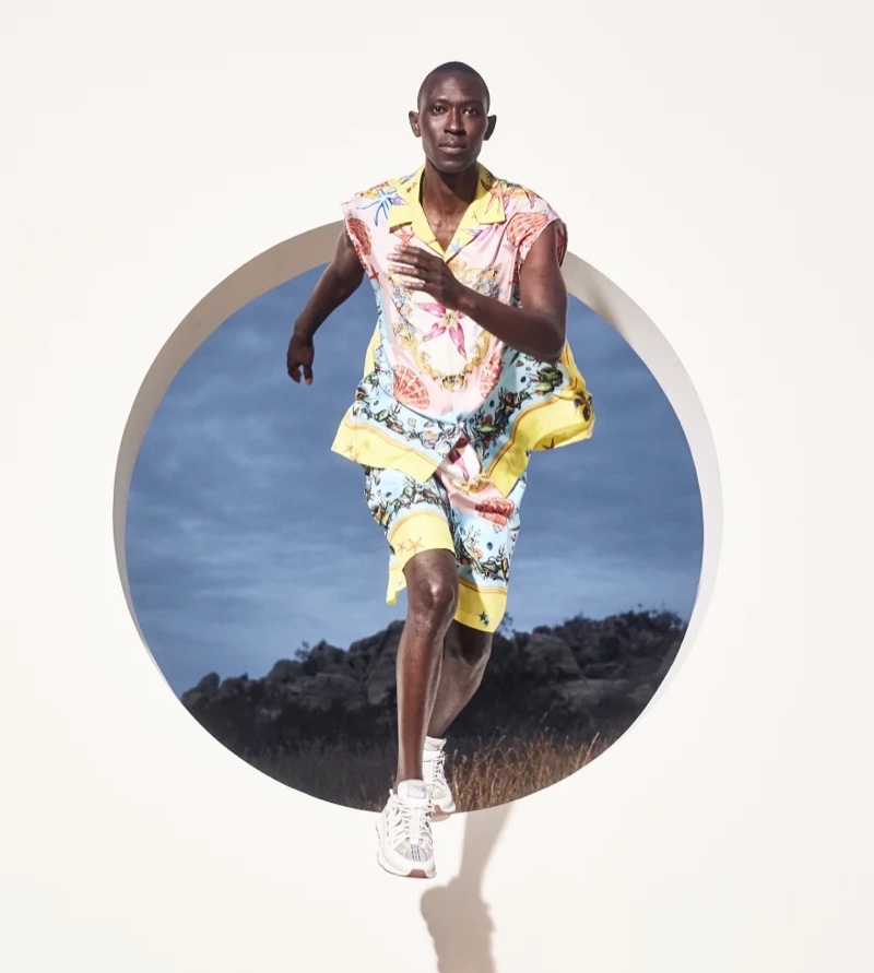 Revisit Gianni Versace's 1992 "Trésor de la Mer" collection with this relaxed printed Versace look worn by Armando Cabral.