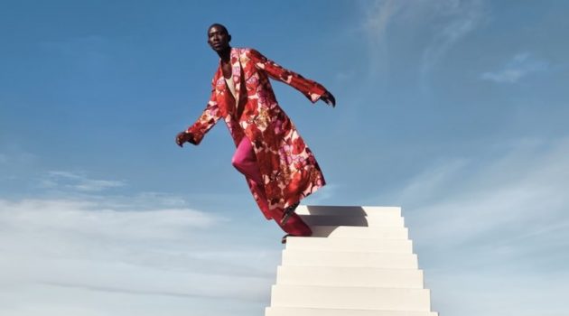 Armando Cabral Dons the Designer Collections for Neiman Marcus A sleek vision, Armando Cabral wears a floral print robe with pink satin pants from Tom Ford.