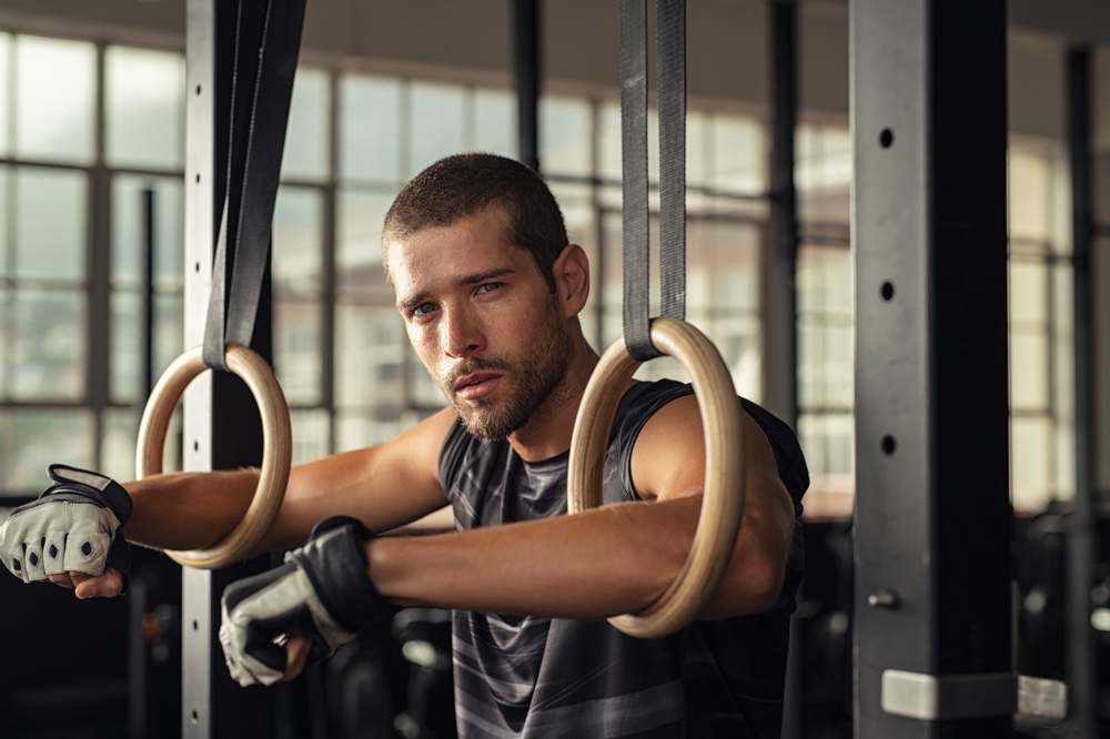 Athlete Gym Rings Tired Attractive Male