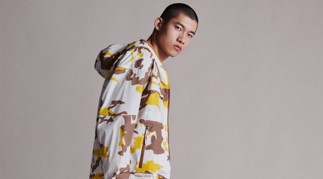 Yun, Valentin, Luc & Jeremiah in Must-have BOSS Style Modeling a sporty yellow, brown, and gray look from BOSS, Yun Hoseok wears a camouflage hooded jacket with pants and sneakers.