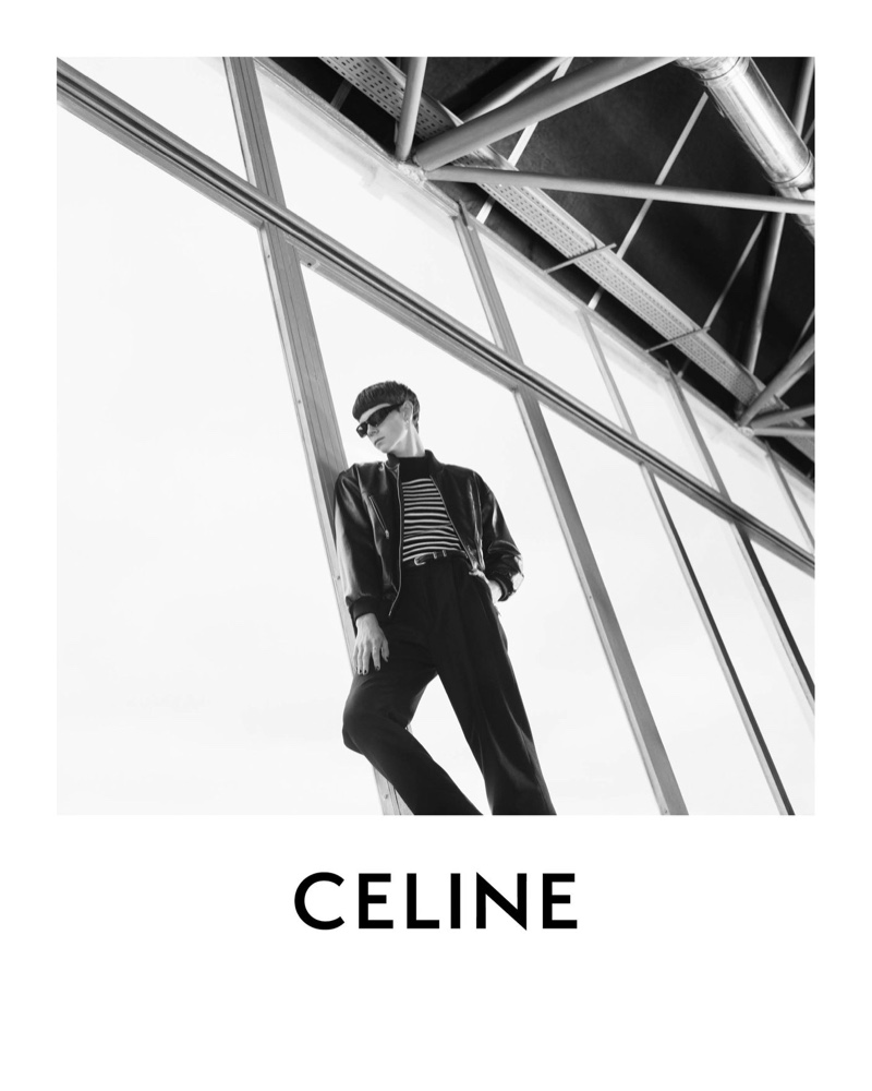 Donning a striped pullover and leather jacket, Isaac Lane fronts Celine's spring-summer 2021 men's campaign.