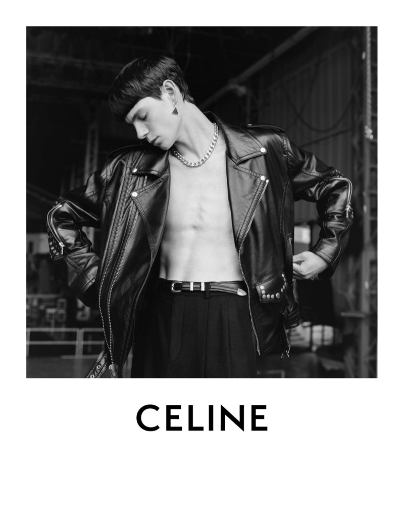 Rocking a leather biker jacket and pleated trousers, Isaac Lane appears in Celine's spring-summer 2021 men's campaign.