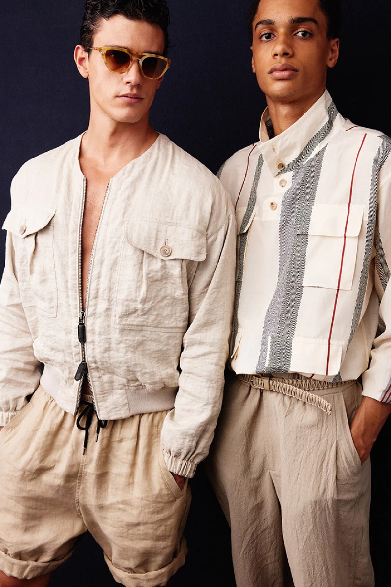 Xavier Serrano and Hugo Tiem sport neutral looks backstage at Giorgio Armani's spring-summer 2021 show. 