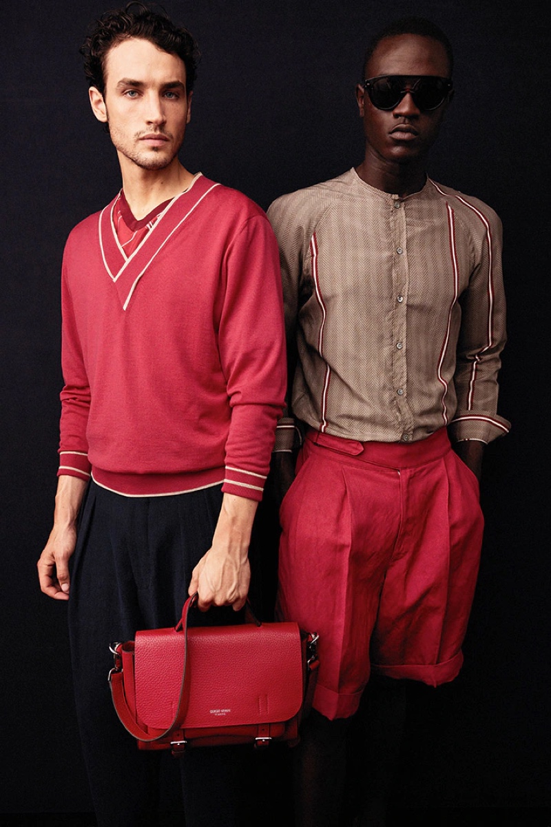 Federico Novello and Ismail Drammeh appear in a backstage image at Giorgio Armani's spring-summer 2022 show.