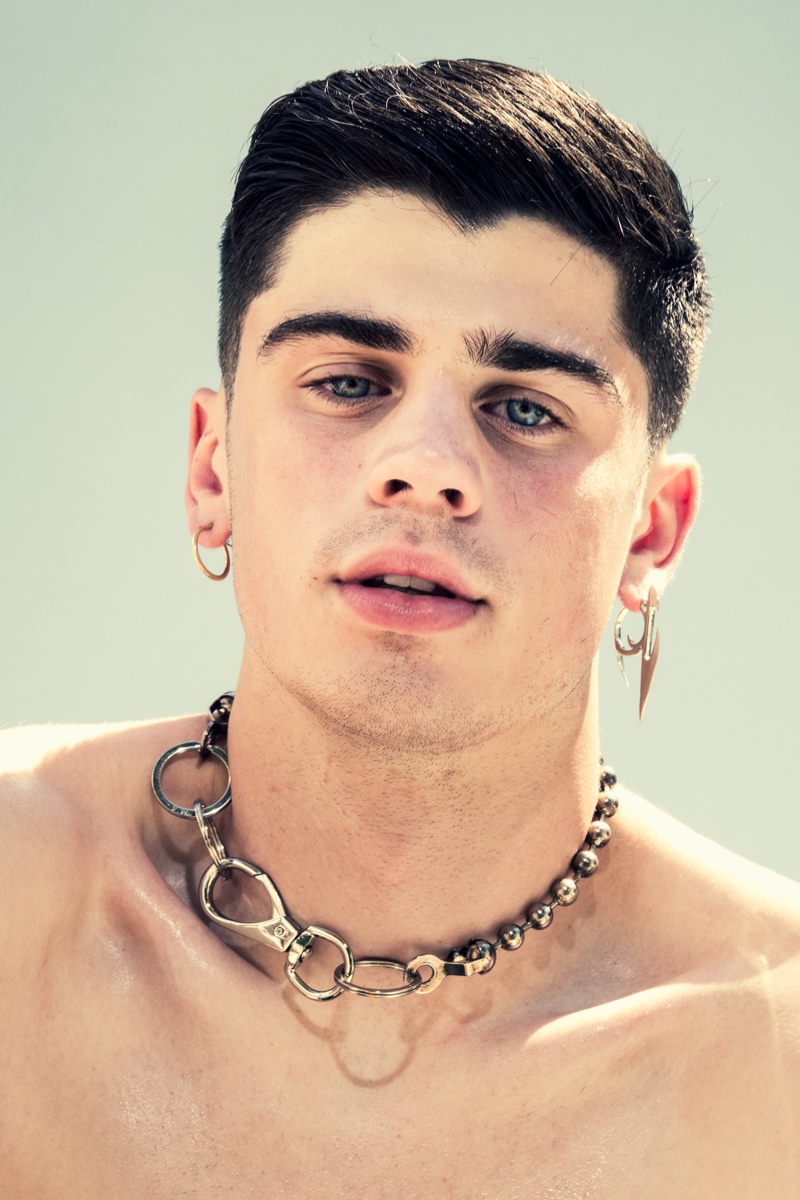 Hunter Beireis wears earring and necklace Martine Ali.