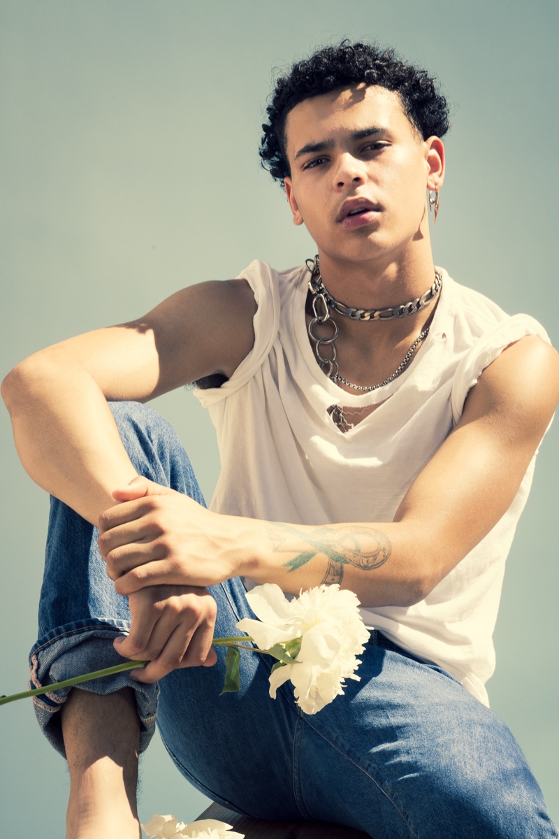 Isaac Searcy wears necklace Martine Ali and earring Austin James Smith.