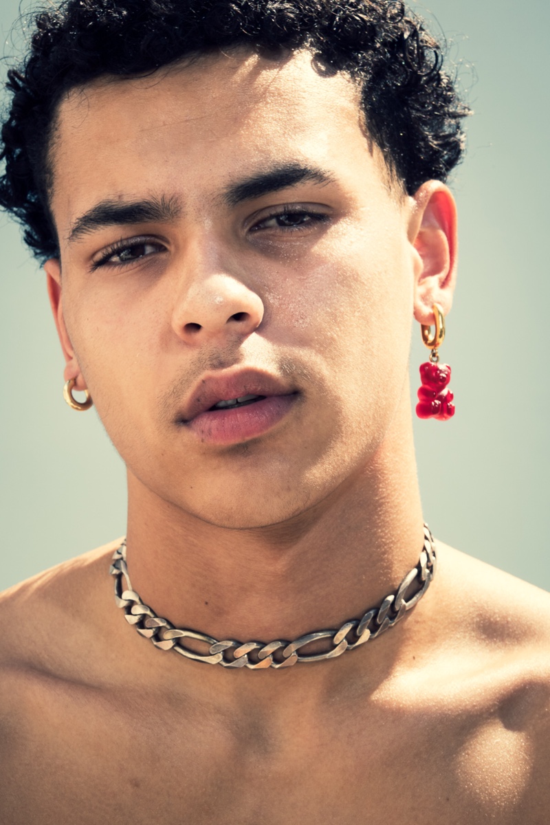 Isaac Searcy wears necklace Martine Ali and earring Balenciaga.