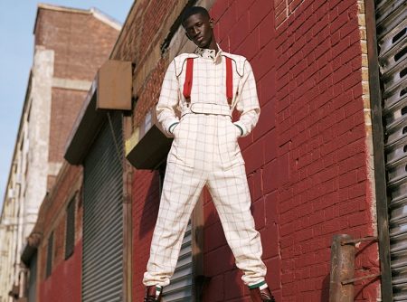 Ibby wears jumpsuit Casablanca, boots Dr Martens, and suspenders Club Room.