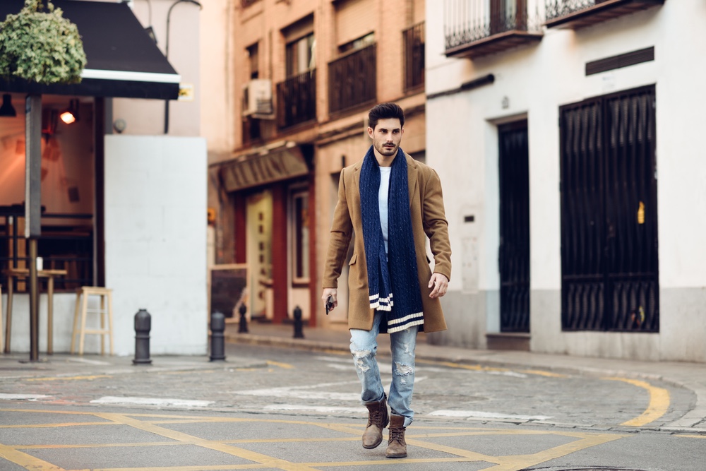 Male Model Walking Street Blue Scarf Brown Coat Ripped Denim Outfit Male Model Walking Street Blue Scarf Brown Coat Ripped Denim Outfit