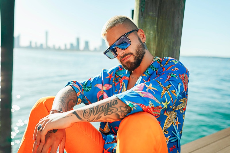 Embracing a retro attitude, Maluma wears Quay's bestselling Nightfall sunglasses.