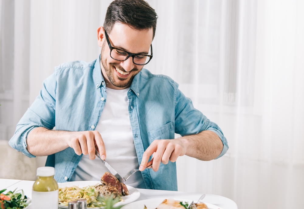 Man Smiling Eating Healthy Plate Food