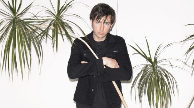 Nicholas Braun Covers British GQ, Talks 'Zola' + 'Succession' Standing tall at 6'7", Nicholas Braun wears an all-black look for a British GQ photoshoot. He sports a t-shirt, jacket, and jeans from Dolce & Gabbana with Grenson boots.