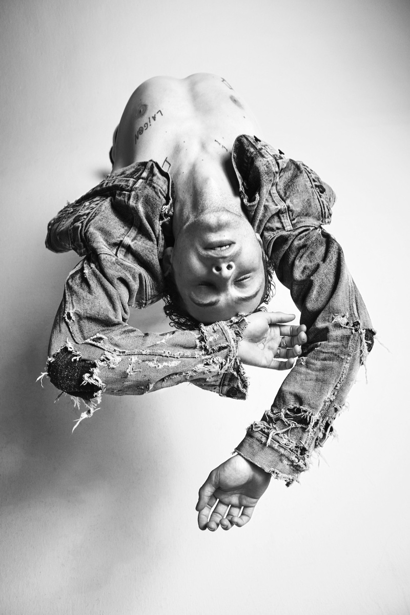 Sonny Hall rocks a destroyed jean jacket for Saint Laurent's new denim campaign.