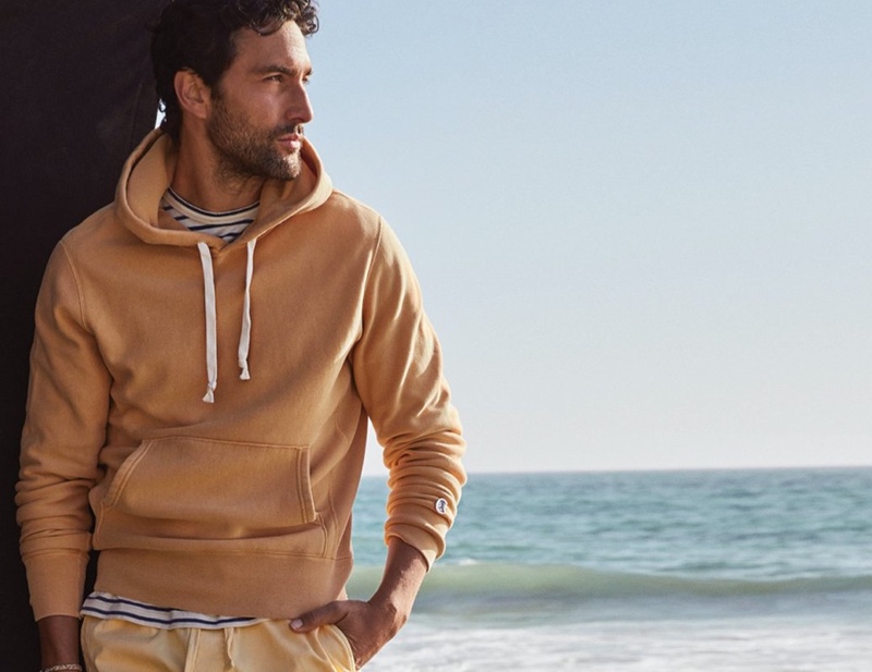 Going casual, Noah Mills wears a Todd Snyder + Champion sun-faded midweight popover hoodie with a Todd Snyder basic stripe tee. » Noah Mills Inspires in Todd Snyder Beach Style Going casual, Noah Mills wears a Todd Snyder + Champion sun-faded midweight popover hoodie with a Todd Snyder basic stripe tee.
