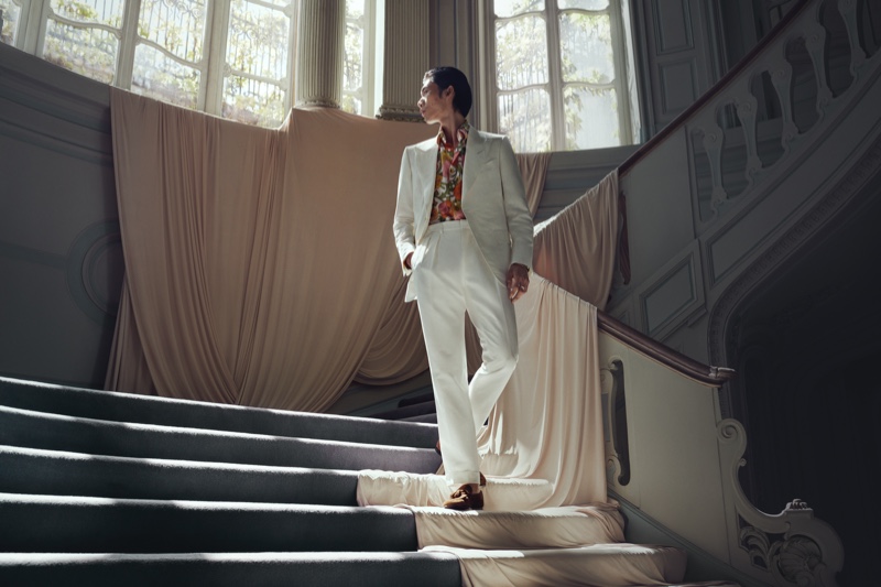 Embracing a dashing Tom Ford look, Hidetatsu Takeuchi  models a printed shirt and silk and linen-blend blazer with trousers.