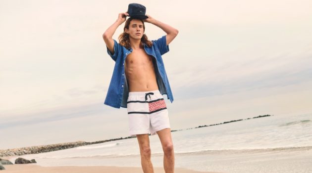 Model Blake Nunn connects with Tommy Hilfiger to showcase its beach-ready summer style.