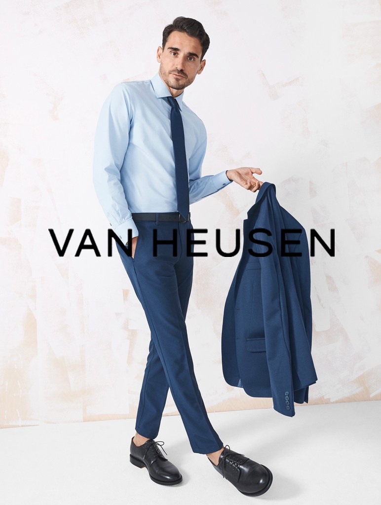 Donning a shirt, suit, and tie, Arthur Kulkov fronts Van Heusen's summer 2021 men's campaign.