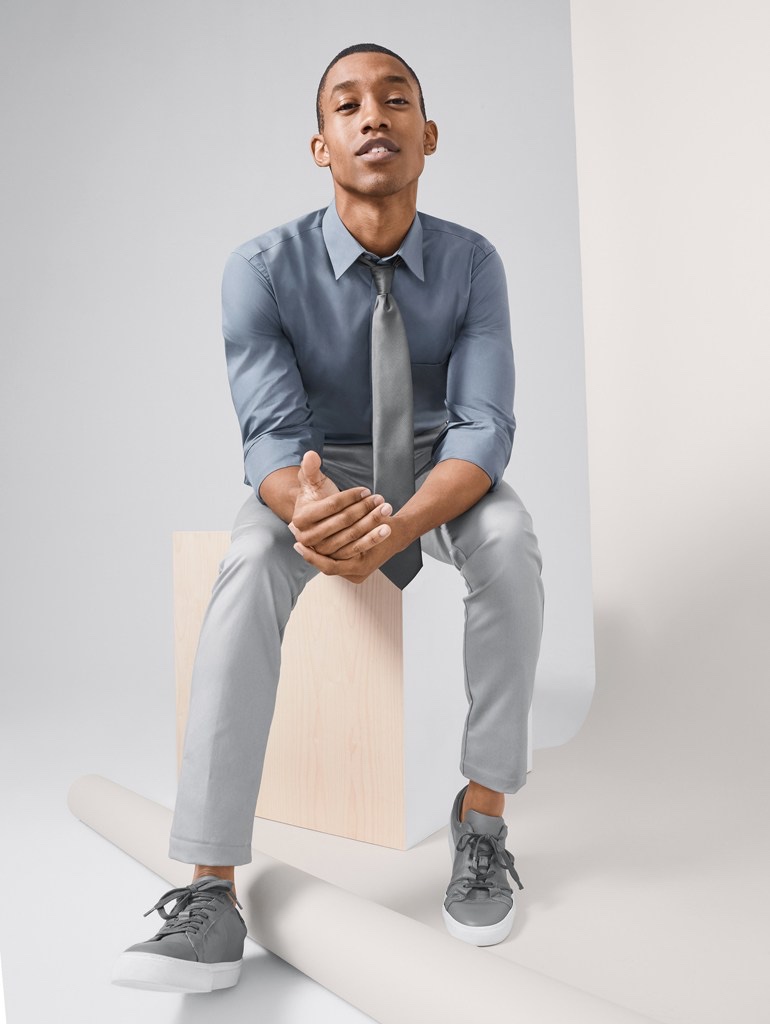 Front and center, Jerel Anderson wears shades of gray in a smart look from Van Heusen.